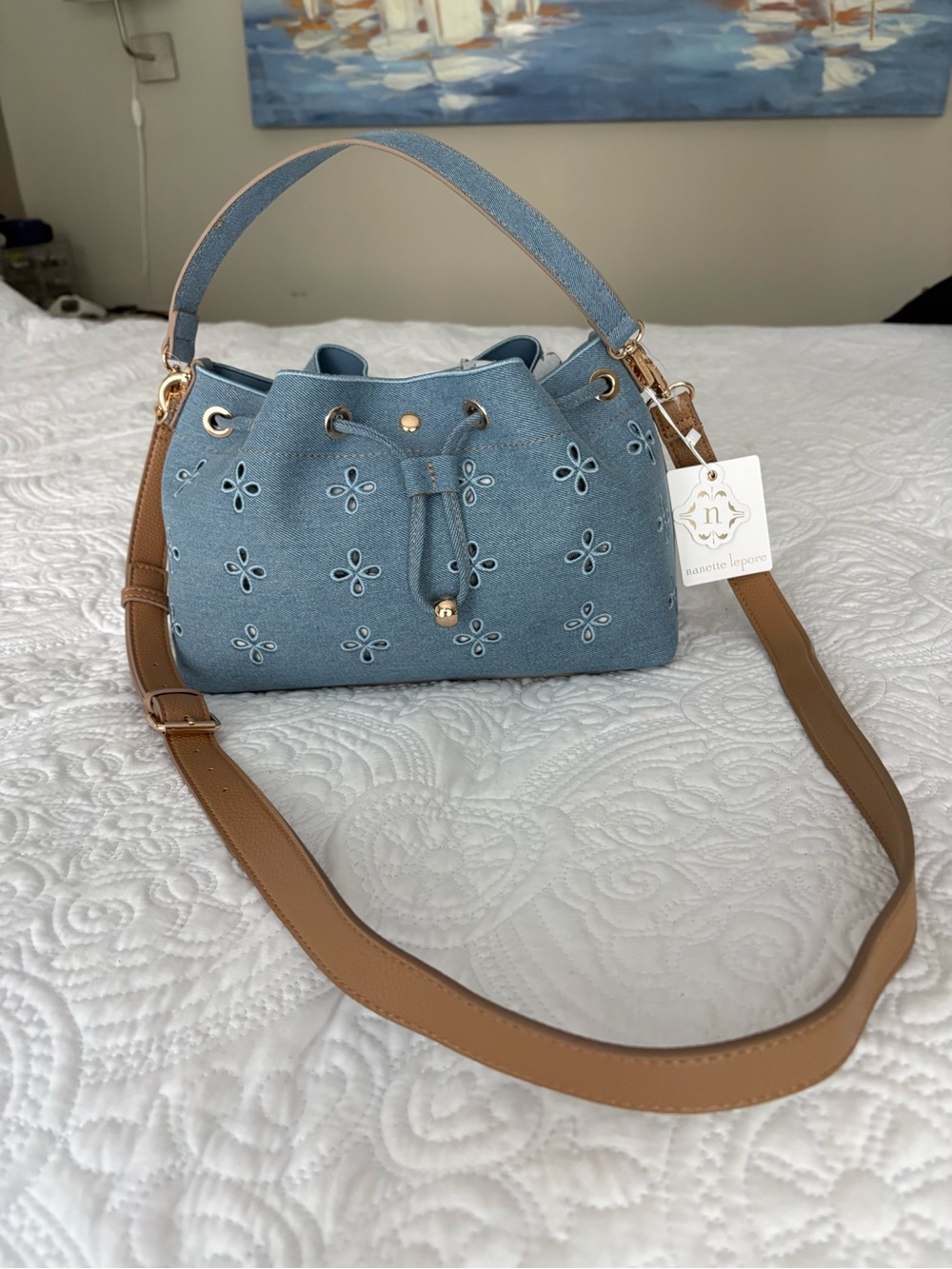 Nanette Lepore Light Blue Denim Floral Eyelet Drawstring Crossbody w/ Tan Strap